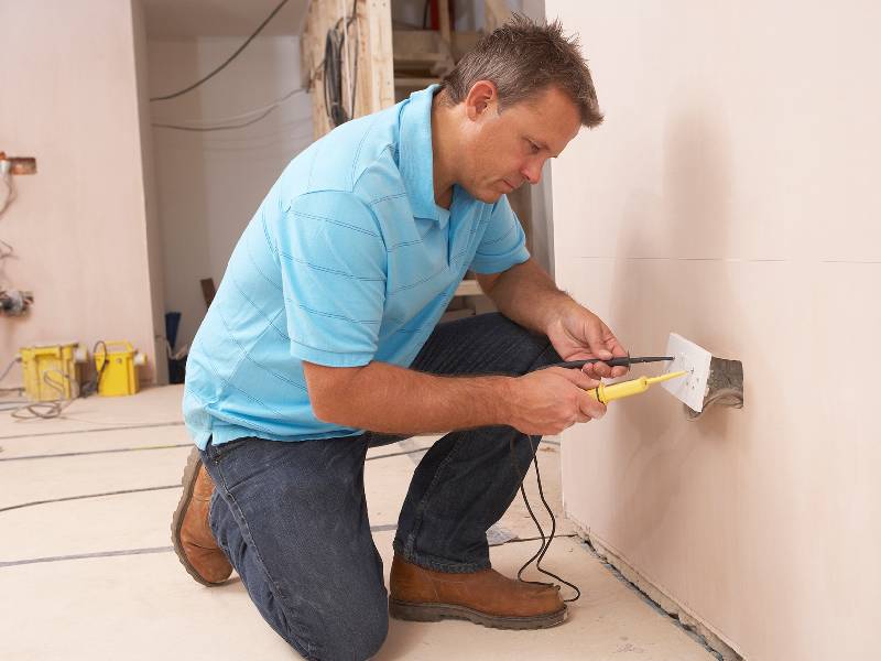 electrician repairing a switch 